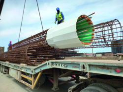 Transport des cages depuis l’aire de préfabrication jusqu’au chantier.